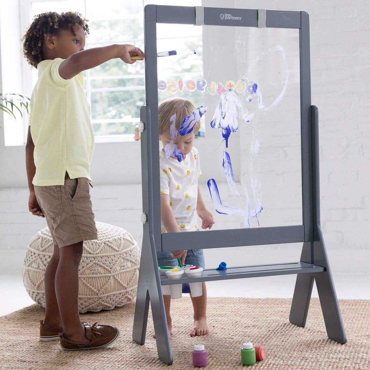 Kids Drawing on Little Partners Peek-A-Boo Easel Grey