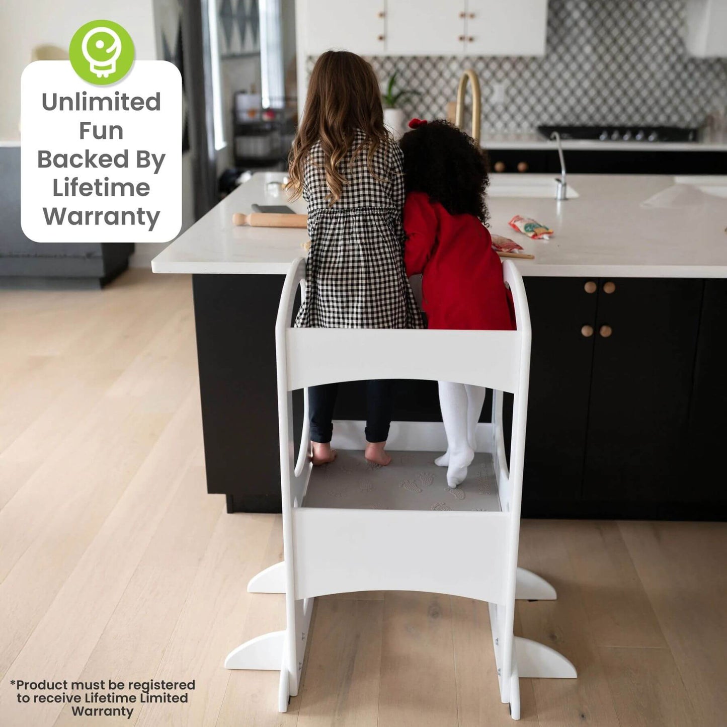 Two Girls Standing on the Same Little Partners The Learning Tower White