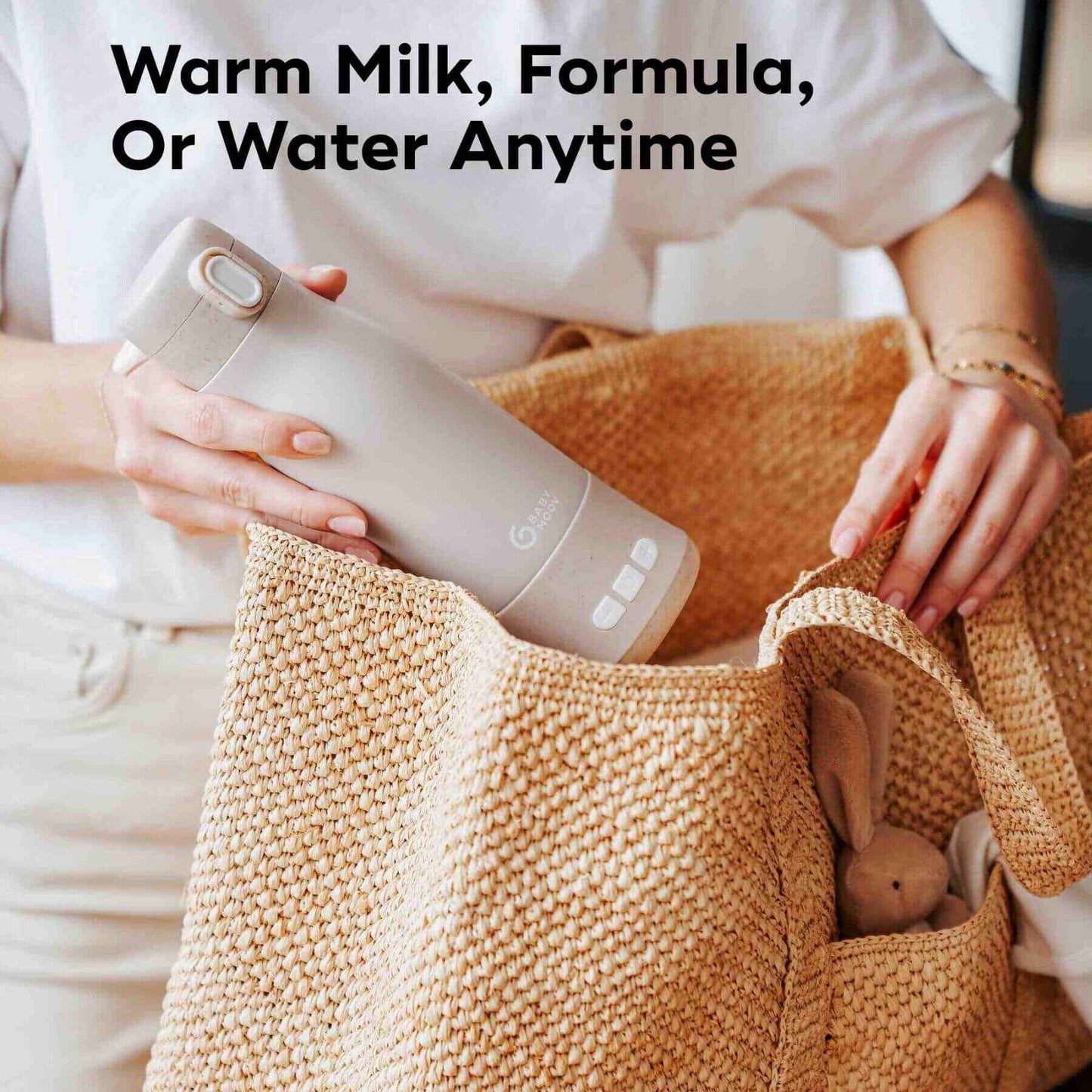 Person holding Moov & Feed Portable Milk and Water Warmer with text about warm milk, formula, or water anytime.