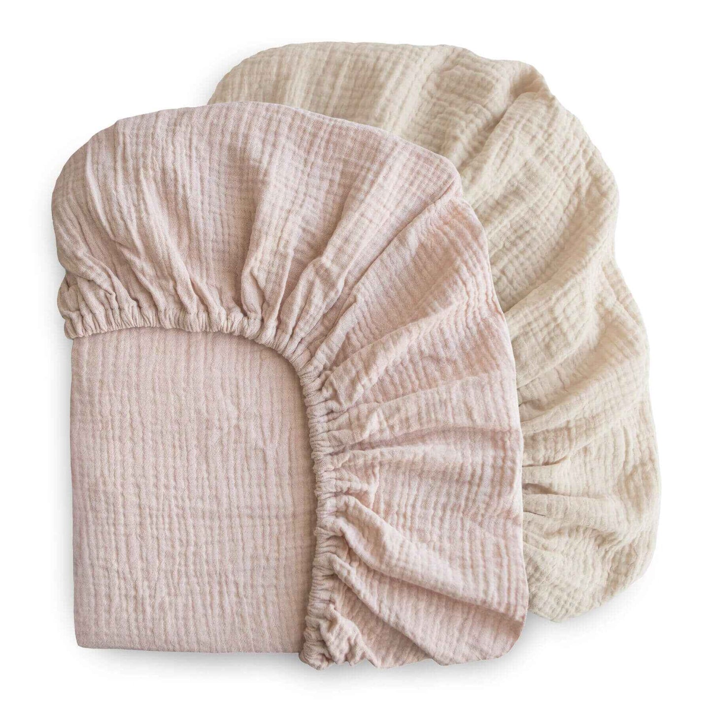mushie two fabric fitted sheets stacked