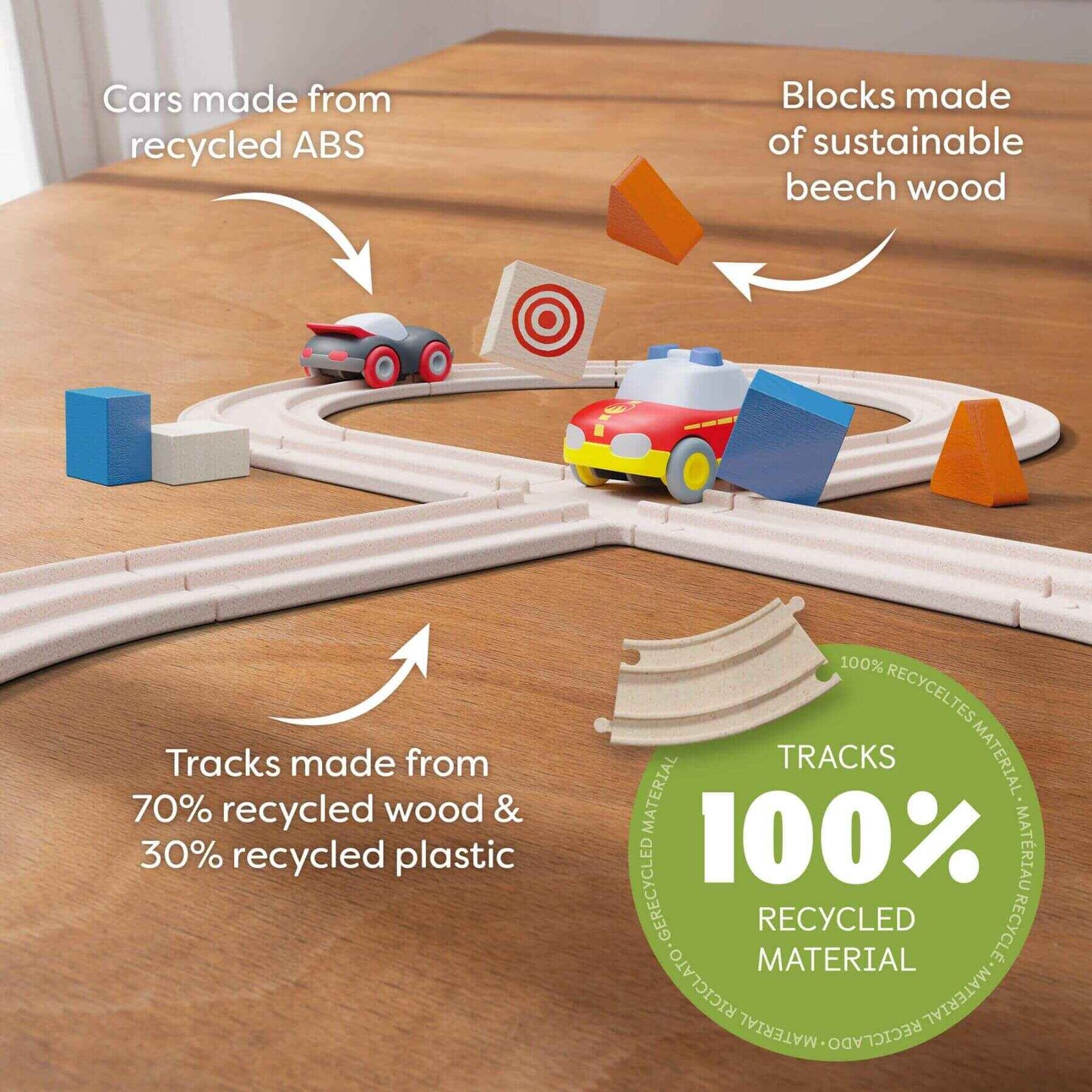 HABA USA Cars - My First Racetrack with recycled materials labels on a wooden surface