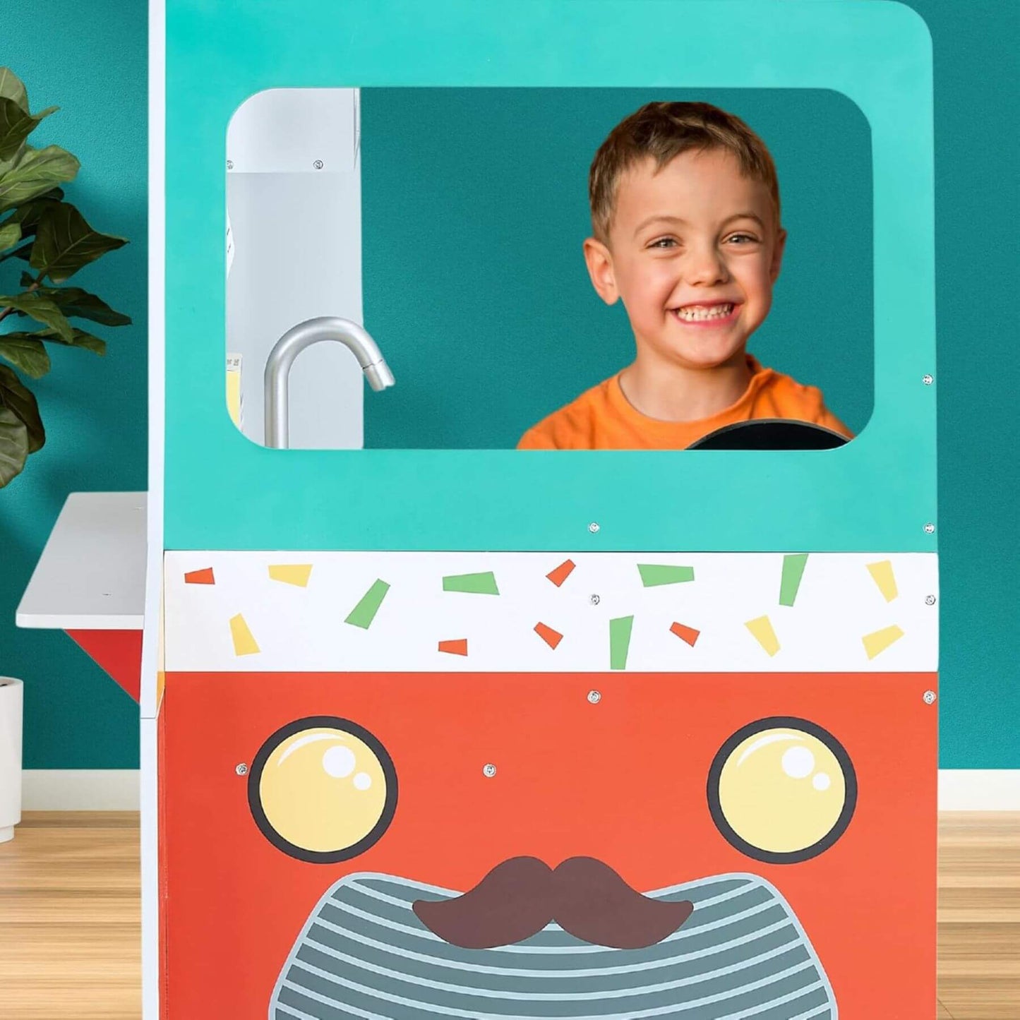 Child posing in Teamson Kids My Little Helper Kids Play Taco Truck Playset