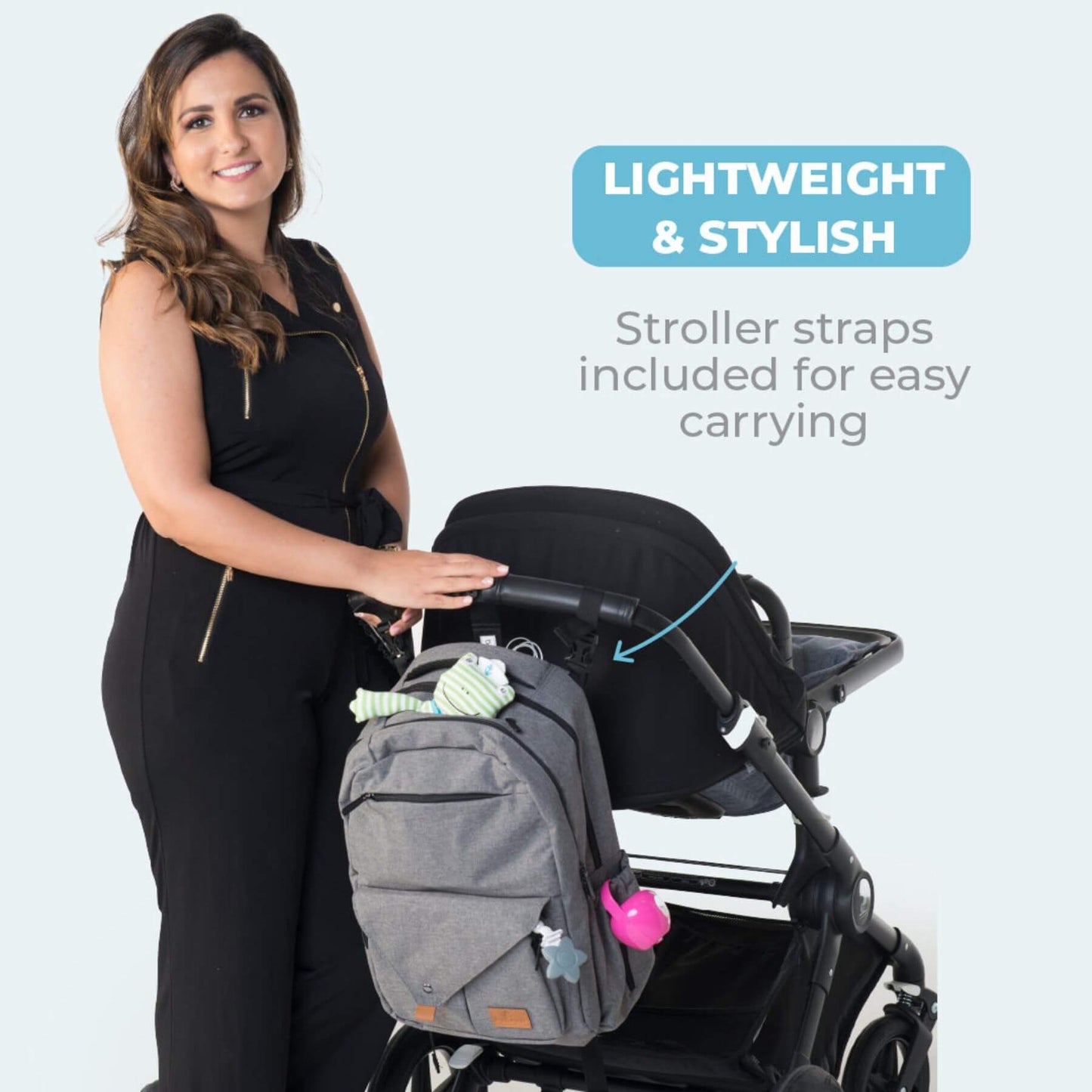 Woman holding a stroller with PerTutti Baby Backpack Diaper Bag attached, featuring text about lightweight and stylish design.