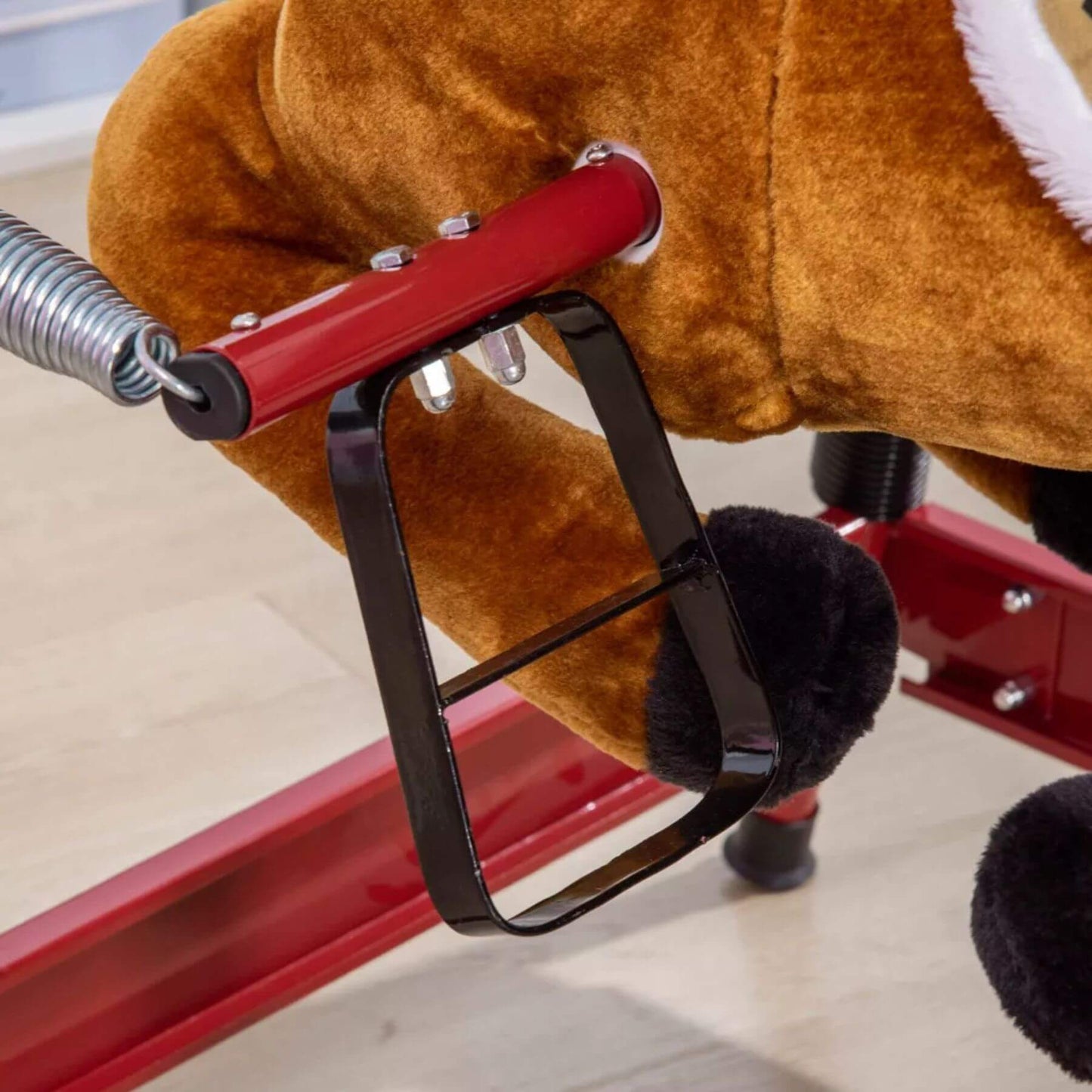 Close-up of Qaba Ride on Horse with Animal Sounds Brown on a light wooden floor.