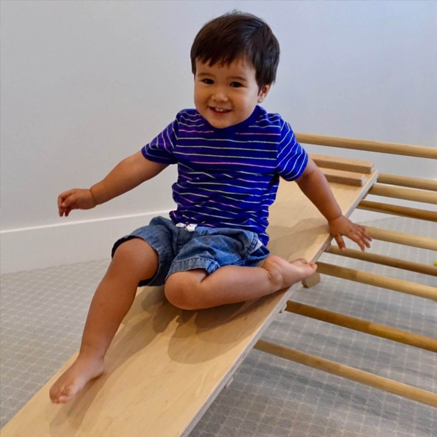 Kid Playing on RAD Children's Furniture Reversible Climbing Ramp