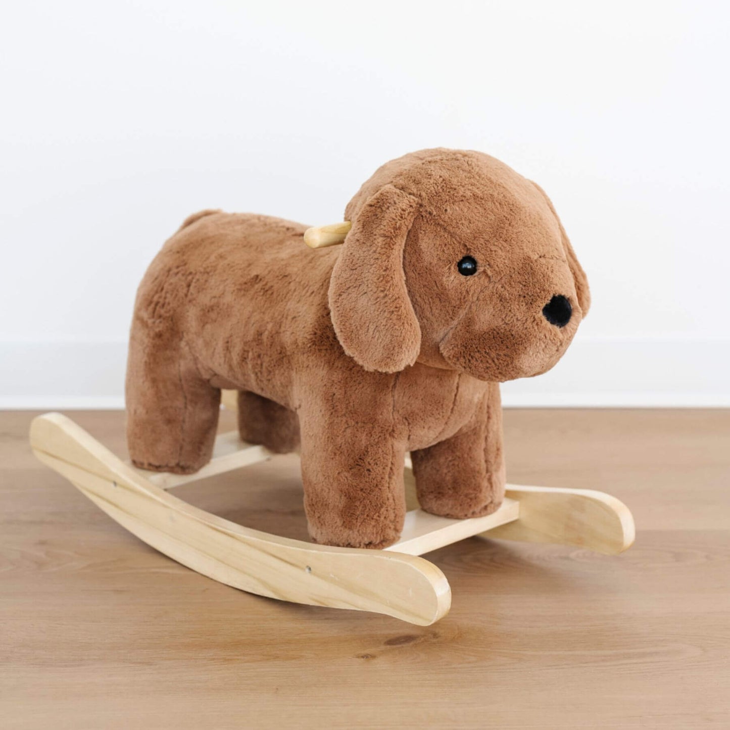 Saranoni Stuffed Animal Rocker - Dog on a wooden surface