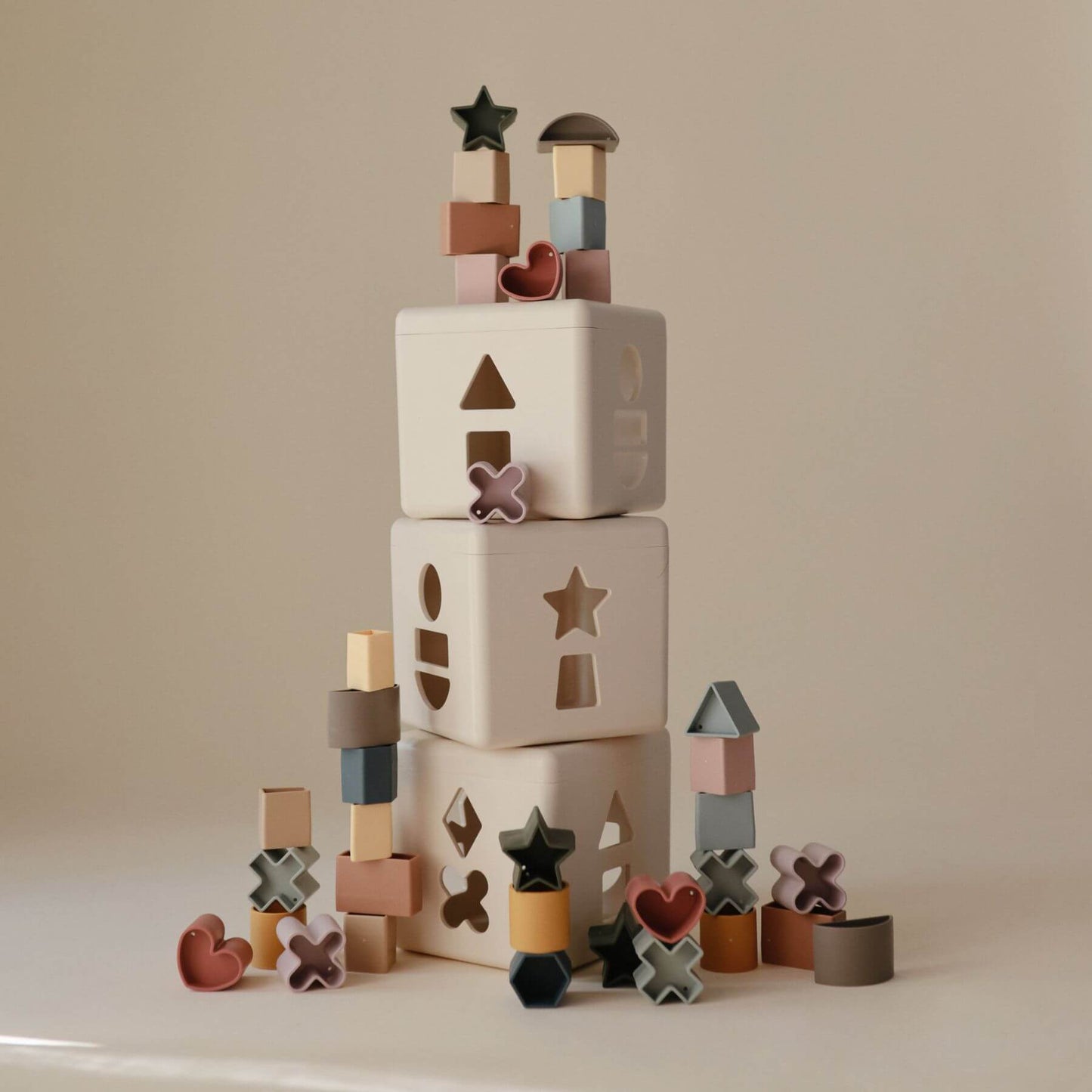Stack of Mushie Shape Sorting Box