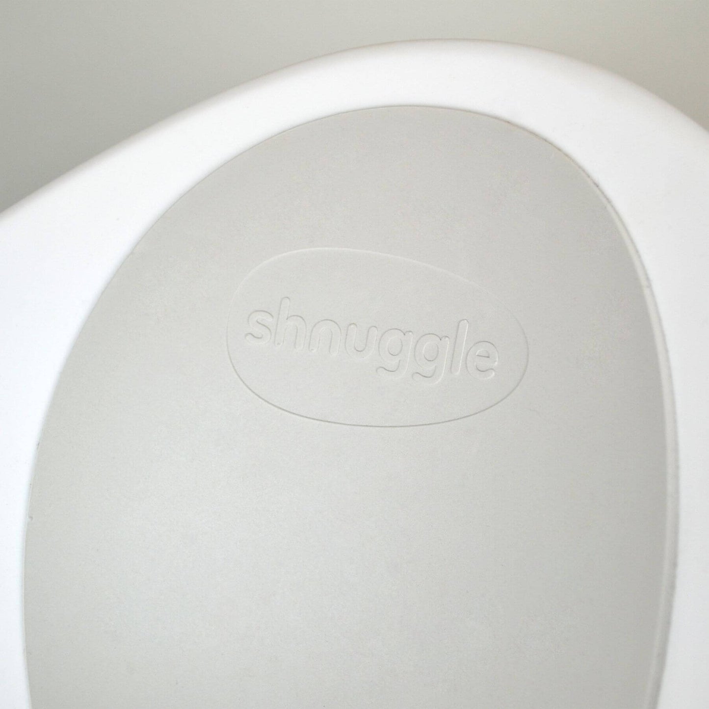 Close-up of Shnuggle Bath & Change Bundle with 'snuggle' branding