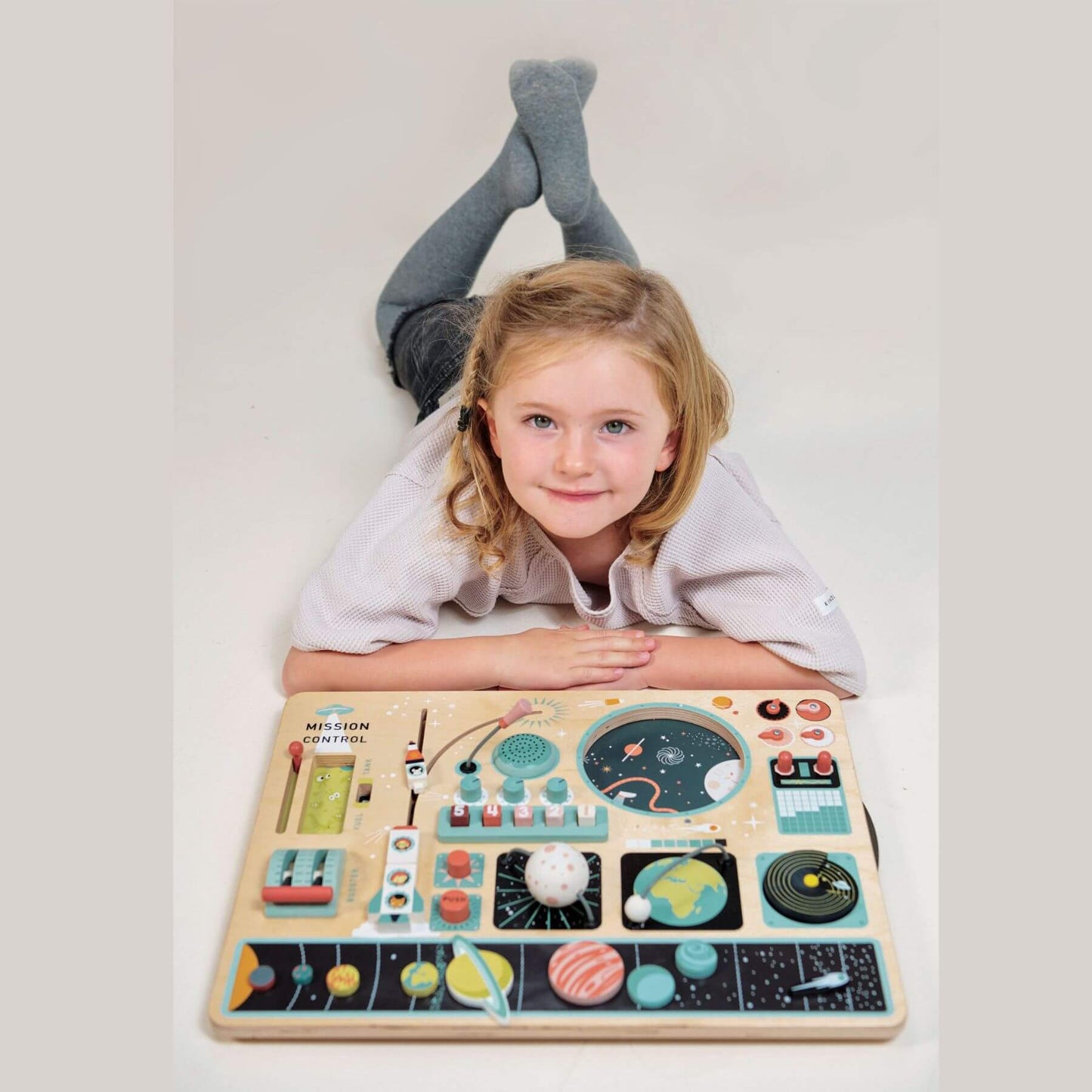 Child playing with Tender Leaf Space Station