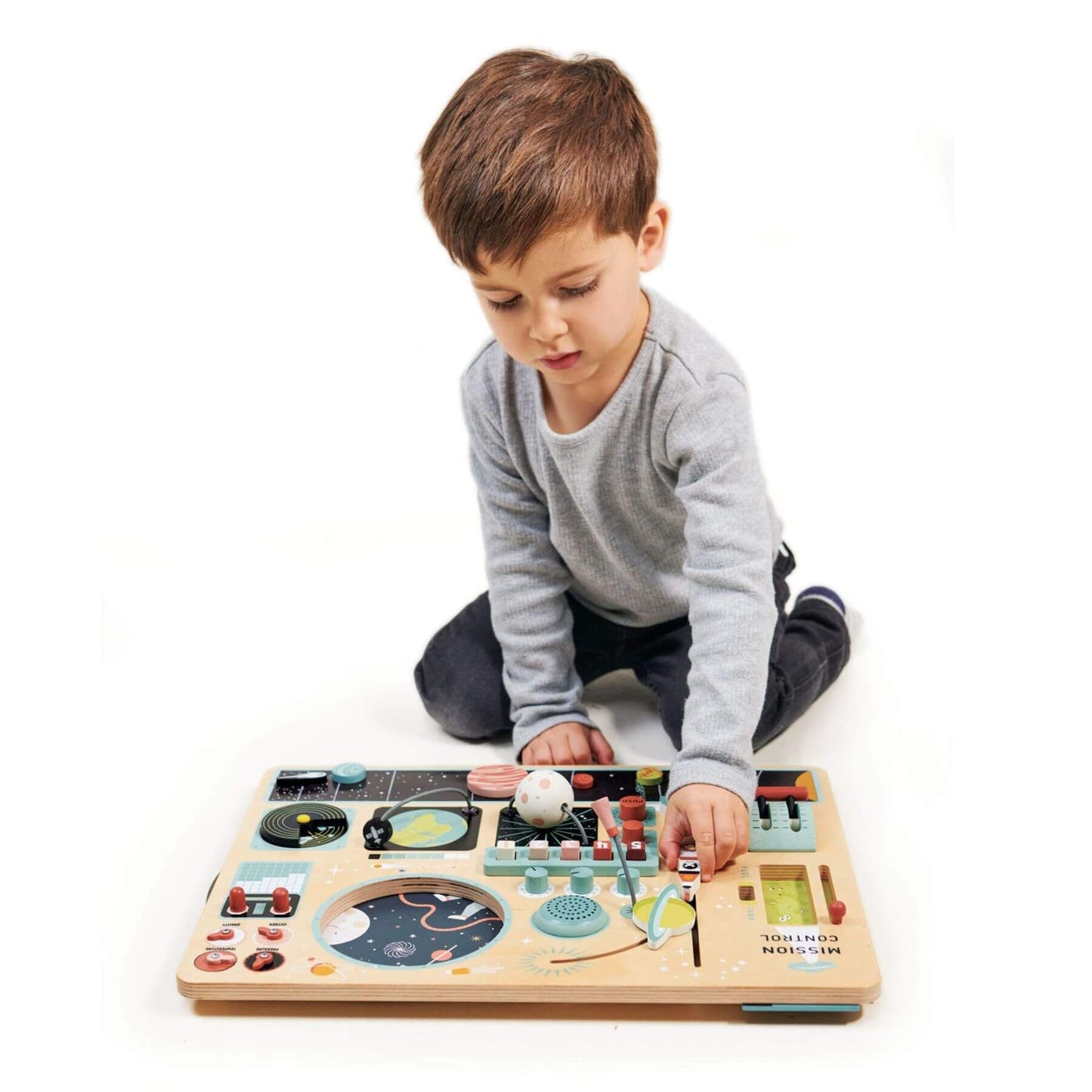Child playing with Tender Leaf Space Station