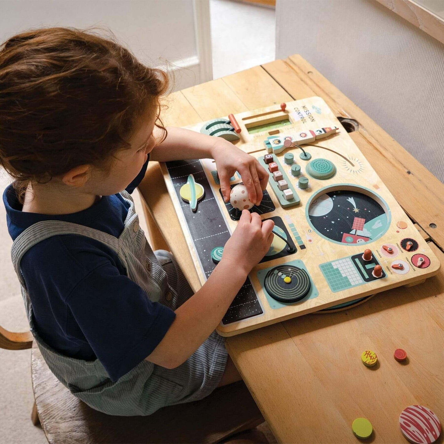 Child playing with Tender Leaf Space Station on a table