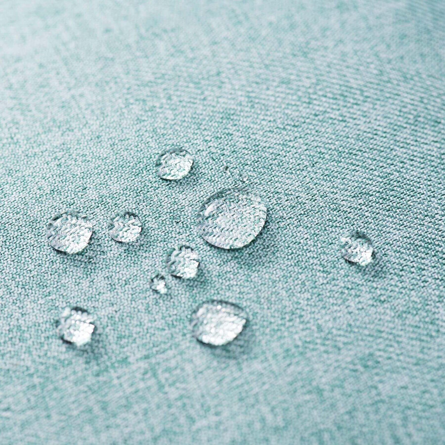 Water droplets on a textured fabric surface