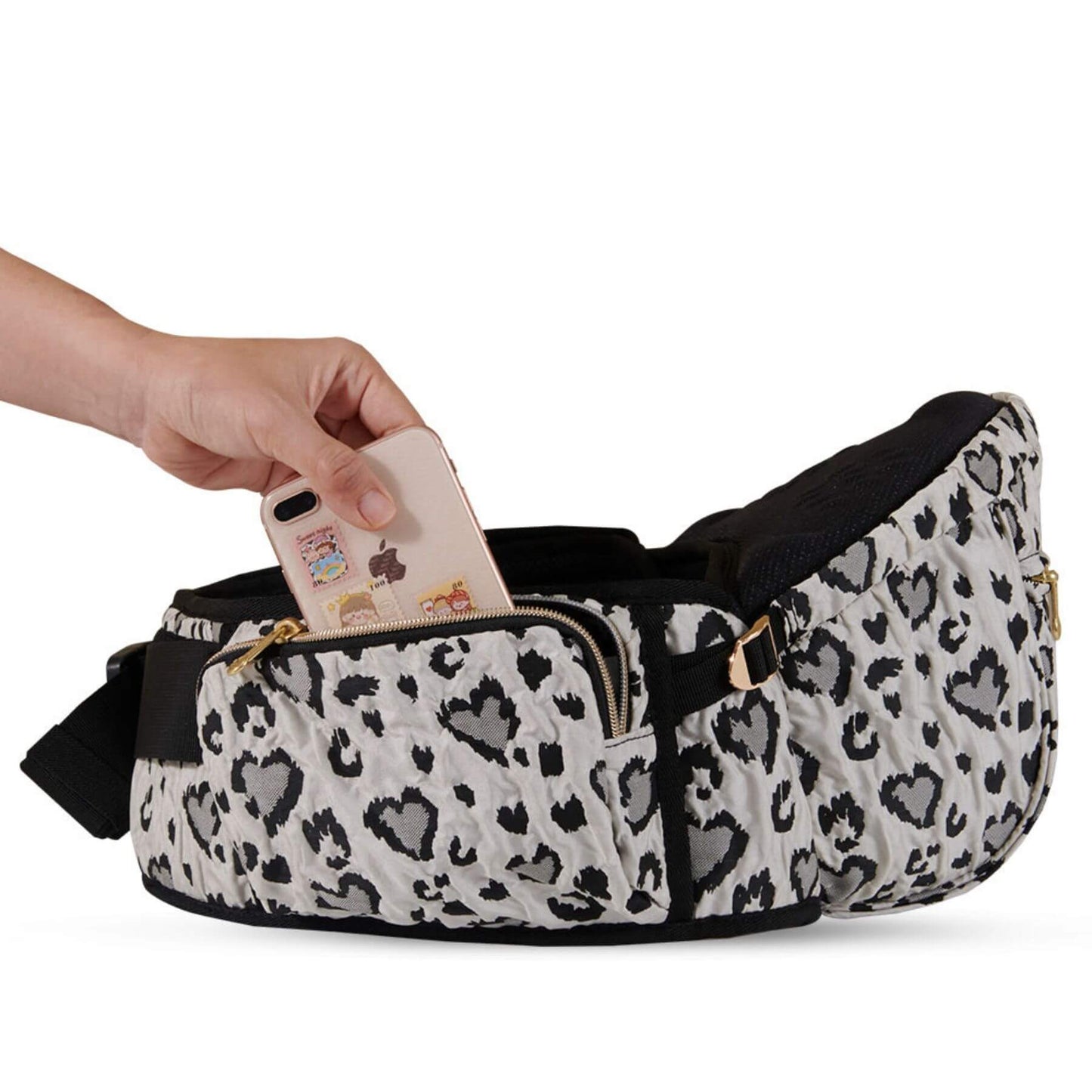 Sunveno Easy Hold Baby Hipseat Carrier with a hand reaching in to place a phone inside on a white background