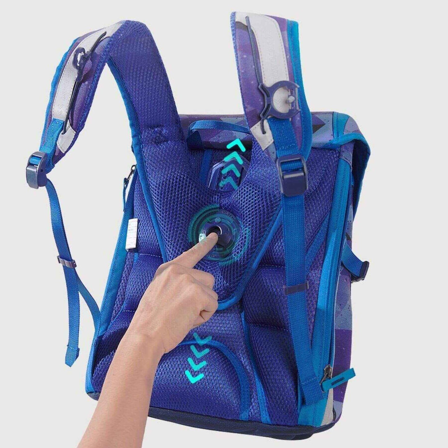 Sunveno Over-clip Kids School Backpack Blue with a hand pressing a button on a light gray background