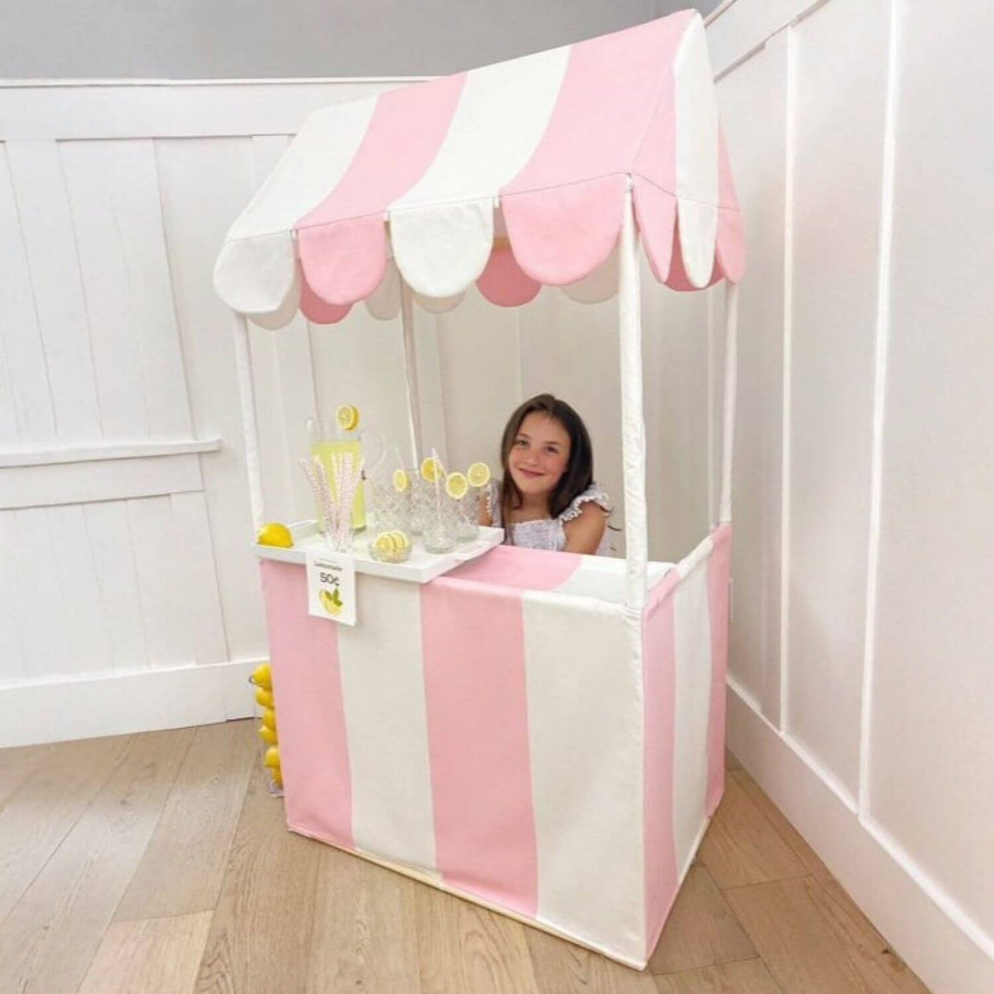 Girl Sitting Behind of Domestic Objects The Market Stand Play Tent Pink