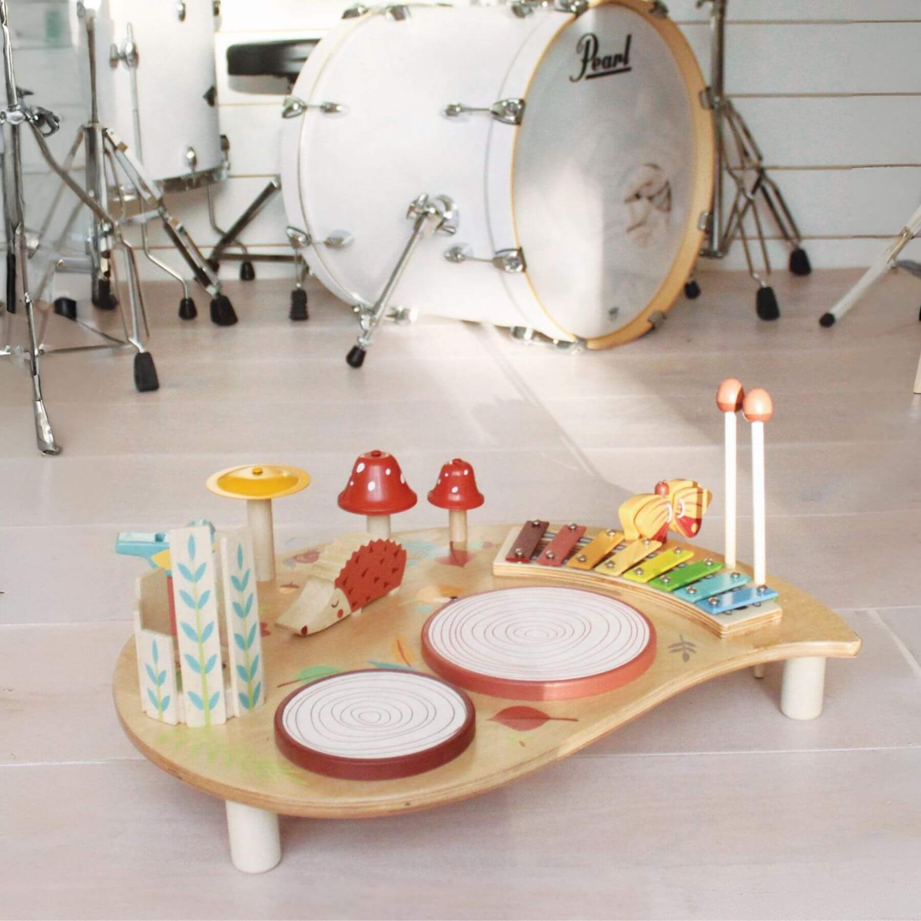 Tender Leaf Musical Table with drums in the background