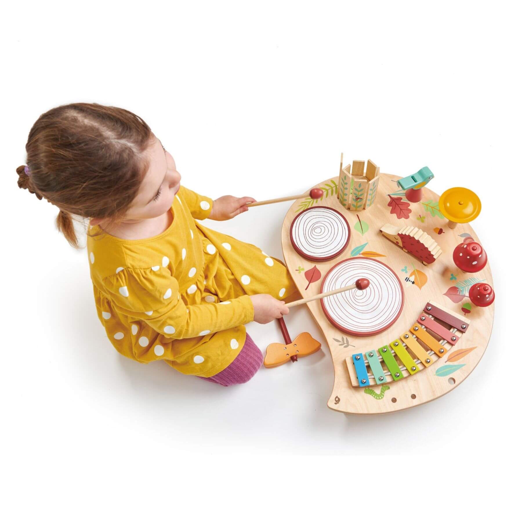 Child playing withTender Leaf Musical Table