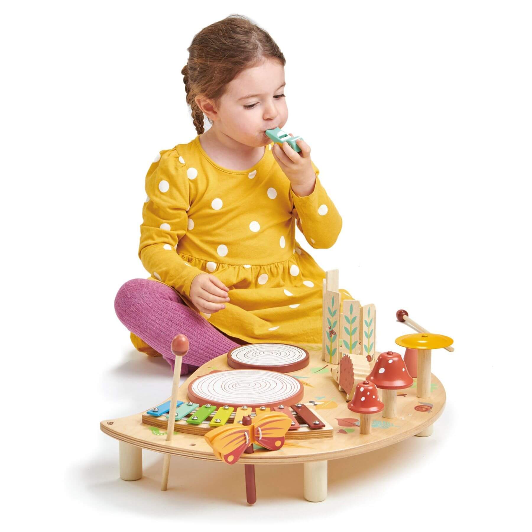 Child playing with Tender Leaf Musical Table