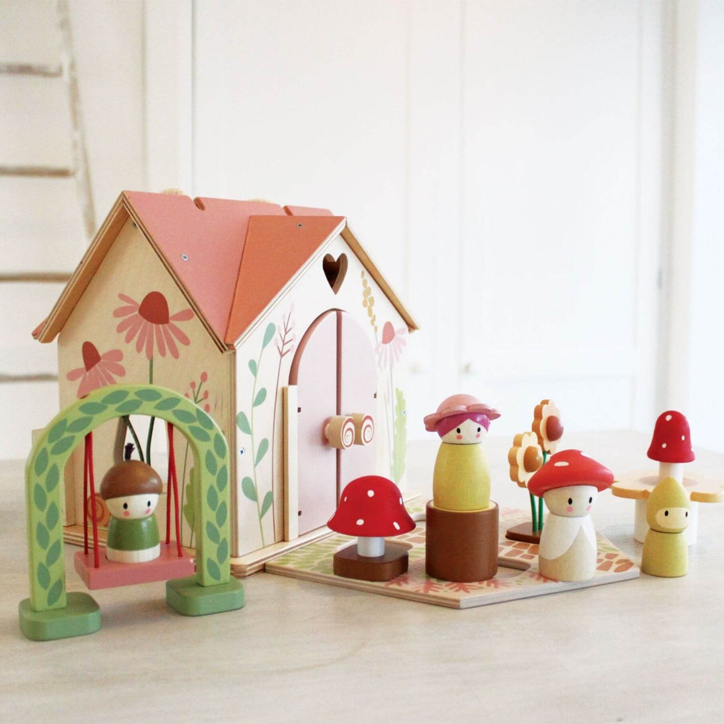 Tender Leaf Rosewood Cottage with colorful accessories on a light surface
