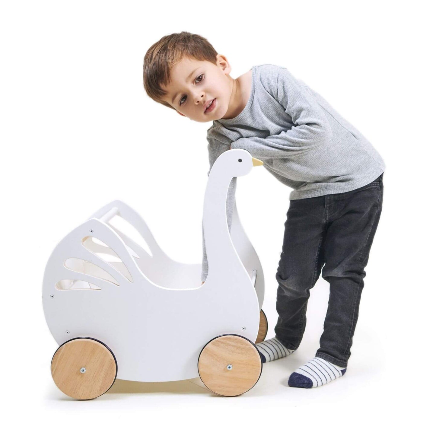 Child playing with Tender Leaf Sweet Swan Pram