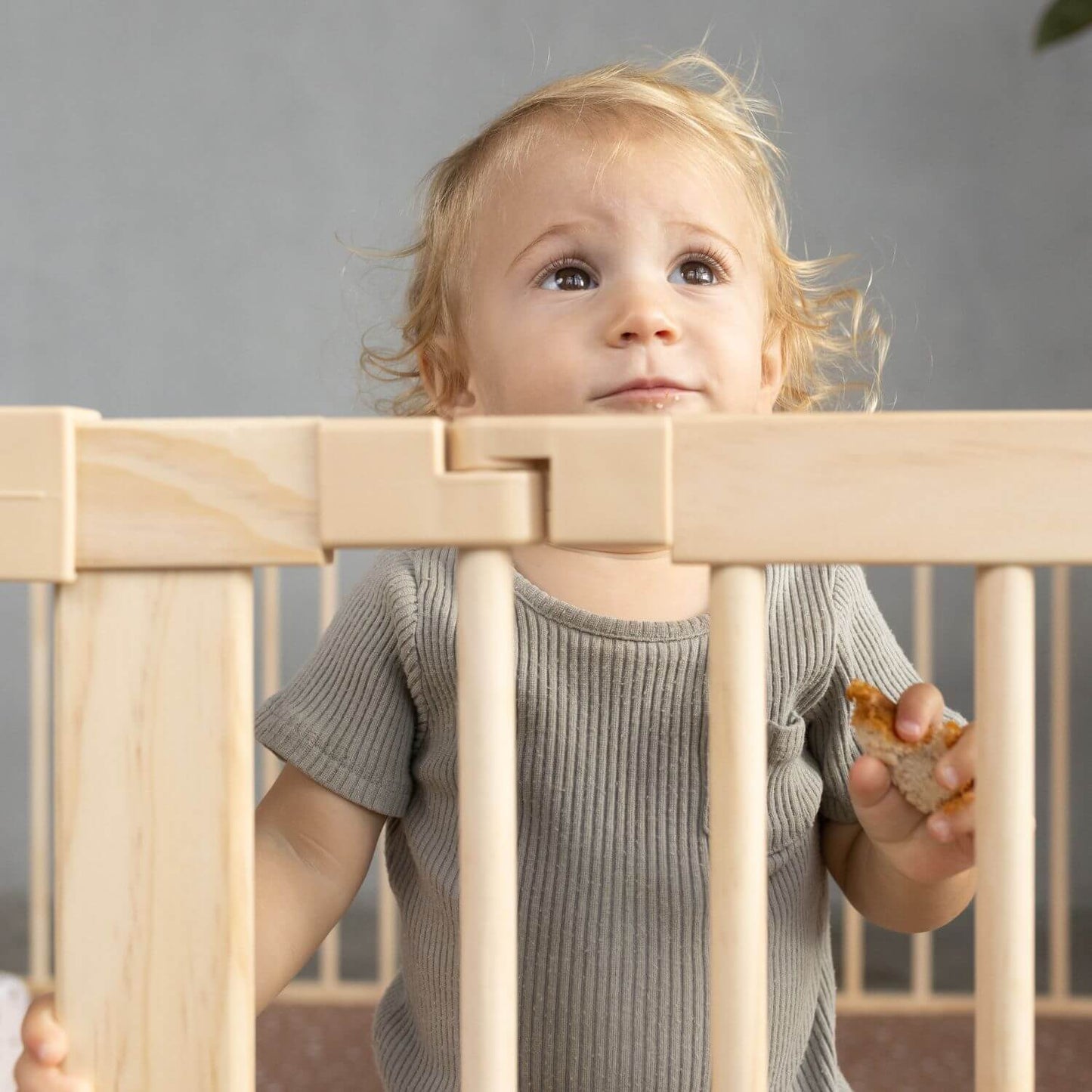 Kid standing in Toki Kids Playpen - Mega Size in Wood