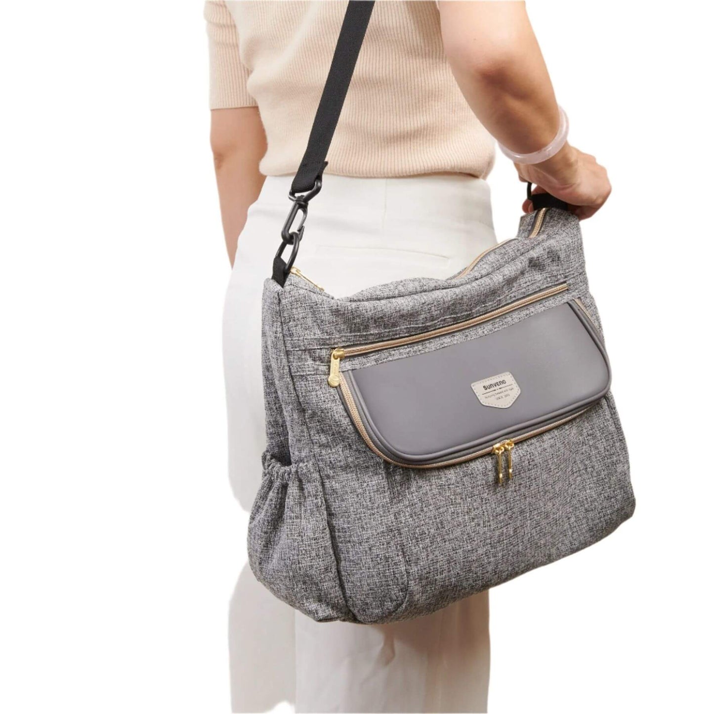 Person holding Tweed Luxe Stroller Organizer Grey