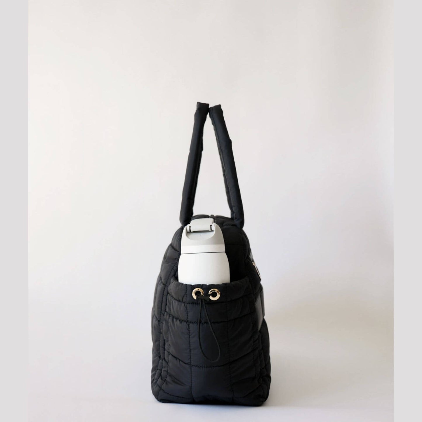 Side View of augustnoa the weekender duffle bag black