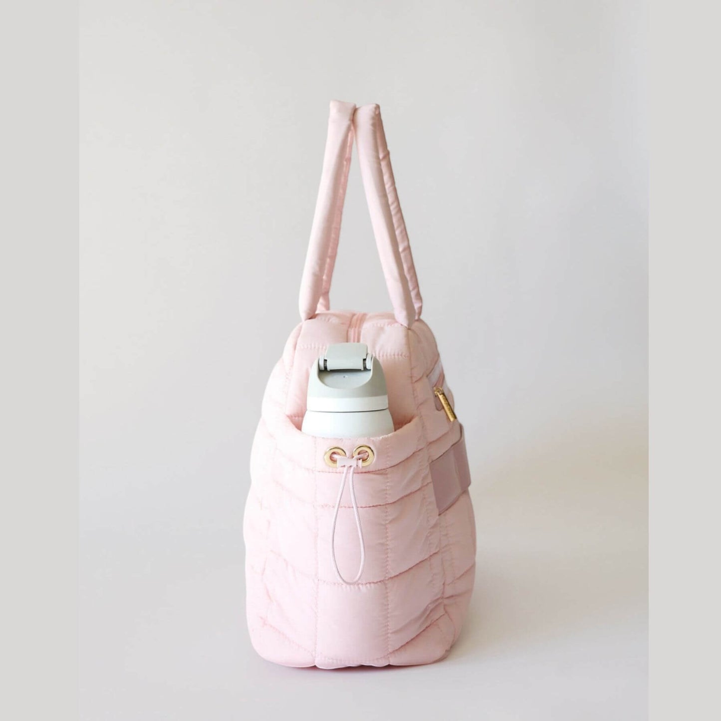 Side View of augustnoa the weekender duffle bag pink