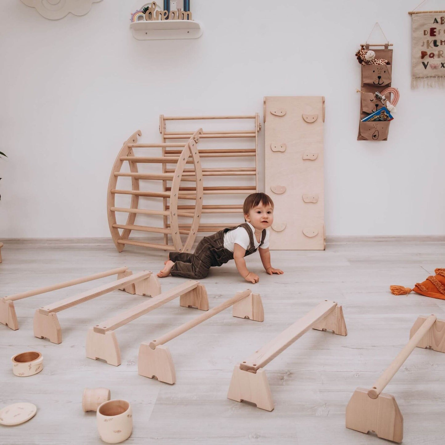 Boy Playing Wood and Hearts Balance Beam Set