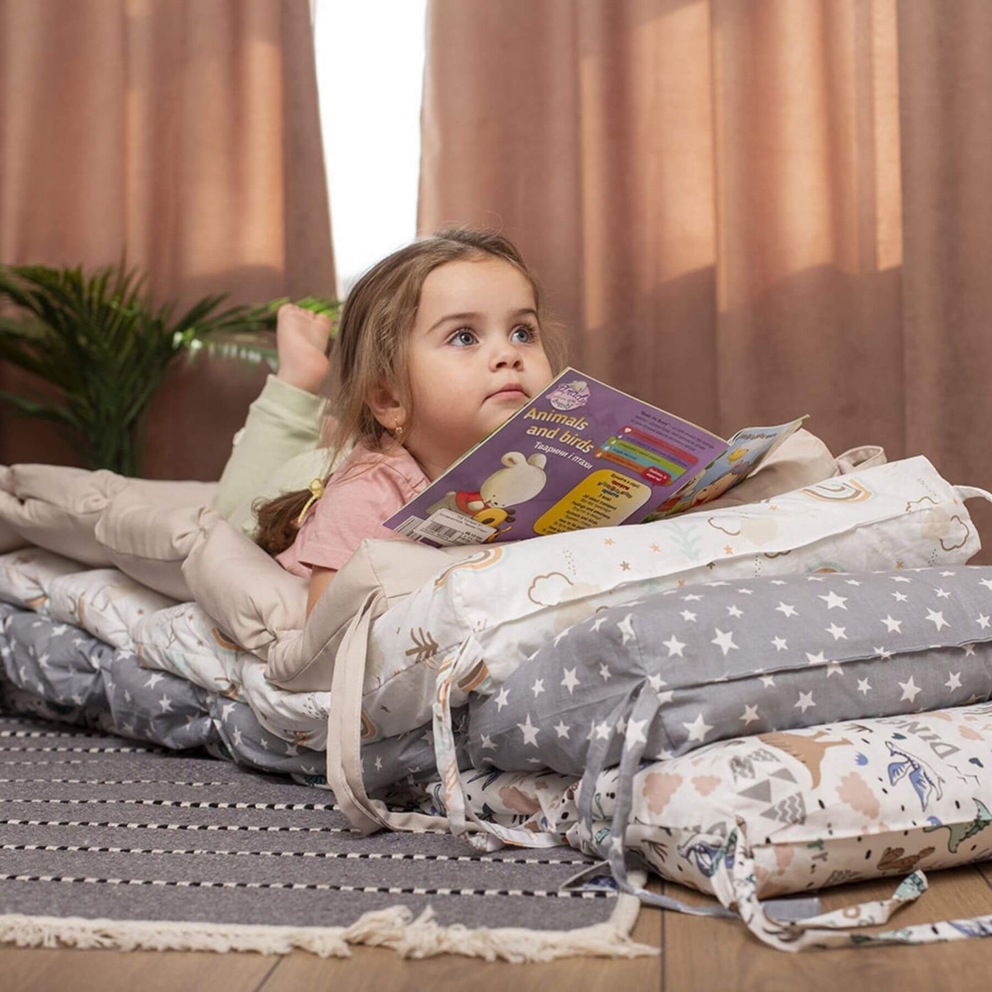 Girl Reading a Book on Wood and Hearts Climbing Arch Cushion