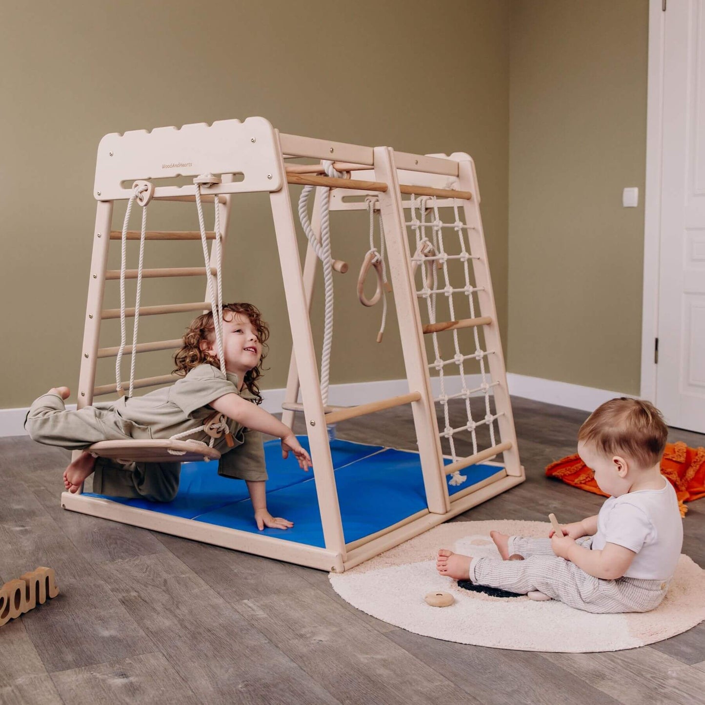 Kids Playing Wood and Hearts Indoor Jungle Gym - Trapeze + 4 Rope