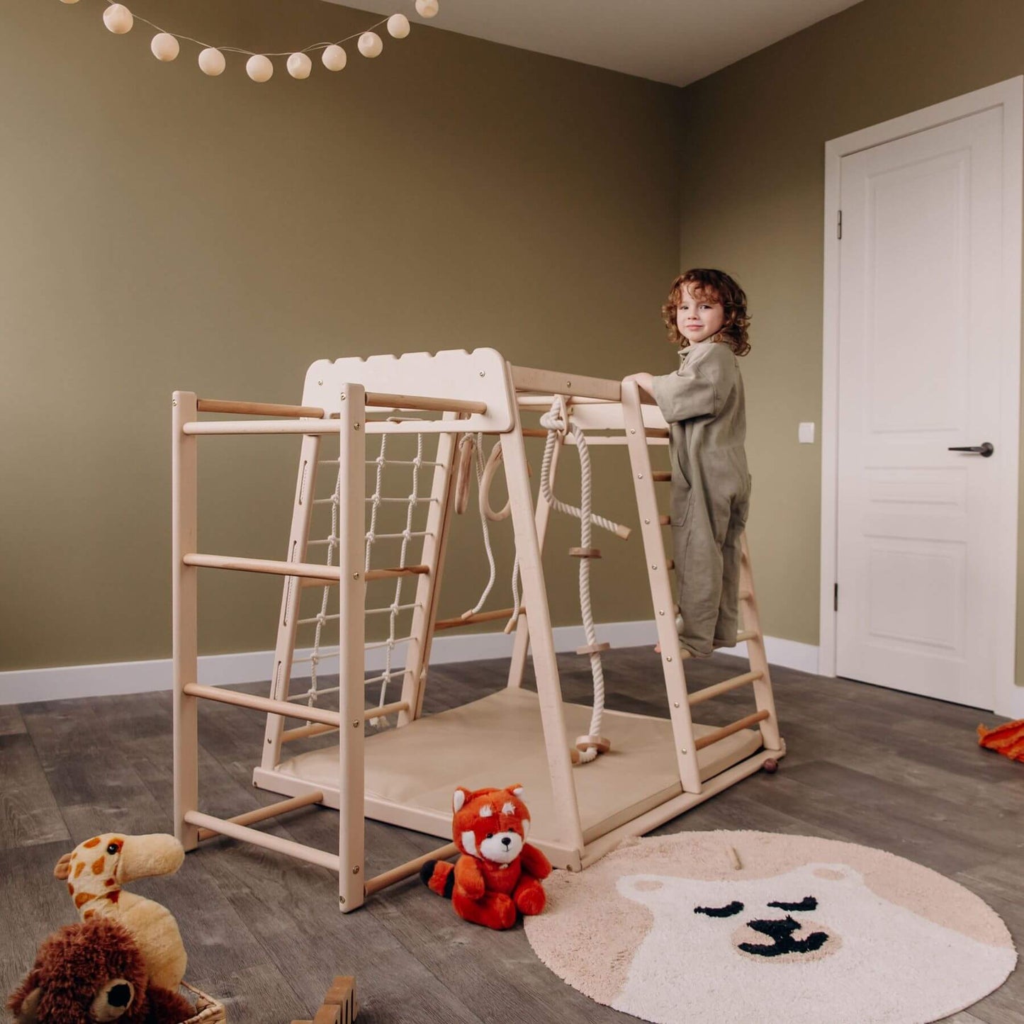 Kid Playing on Wood and Hearts Indoor Jungle Gym - Trapeze + Ladder + Mat + Rope