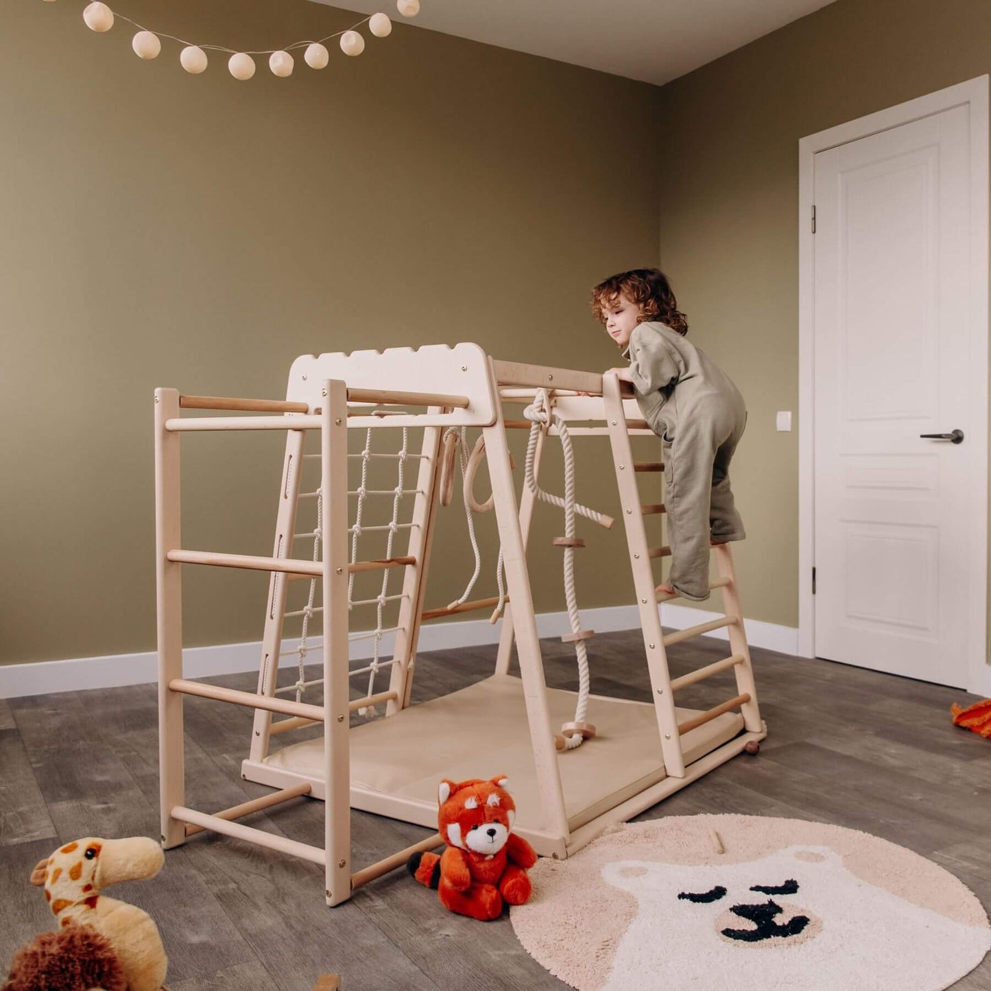 Kid Playing on Wood and Hearts Indoor Jungle Gym - Trapeze + Ladder + Mat + Rope