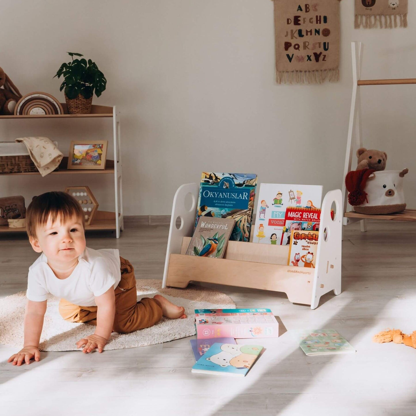 Boy Crawling near Wood and Hearts Kids Bookshelf in White & Natural Wood