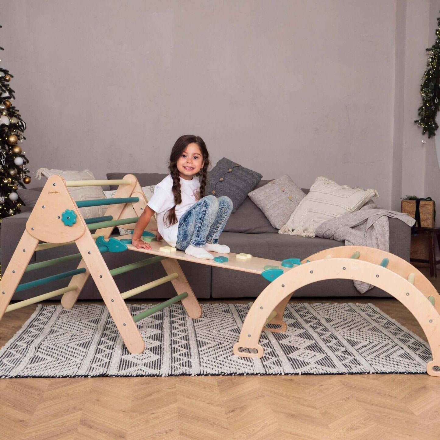 Girl Sitting on Wood and Hearts Montessori Climbing Set of 3