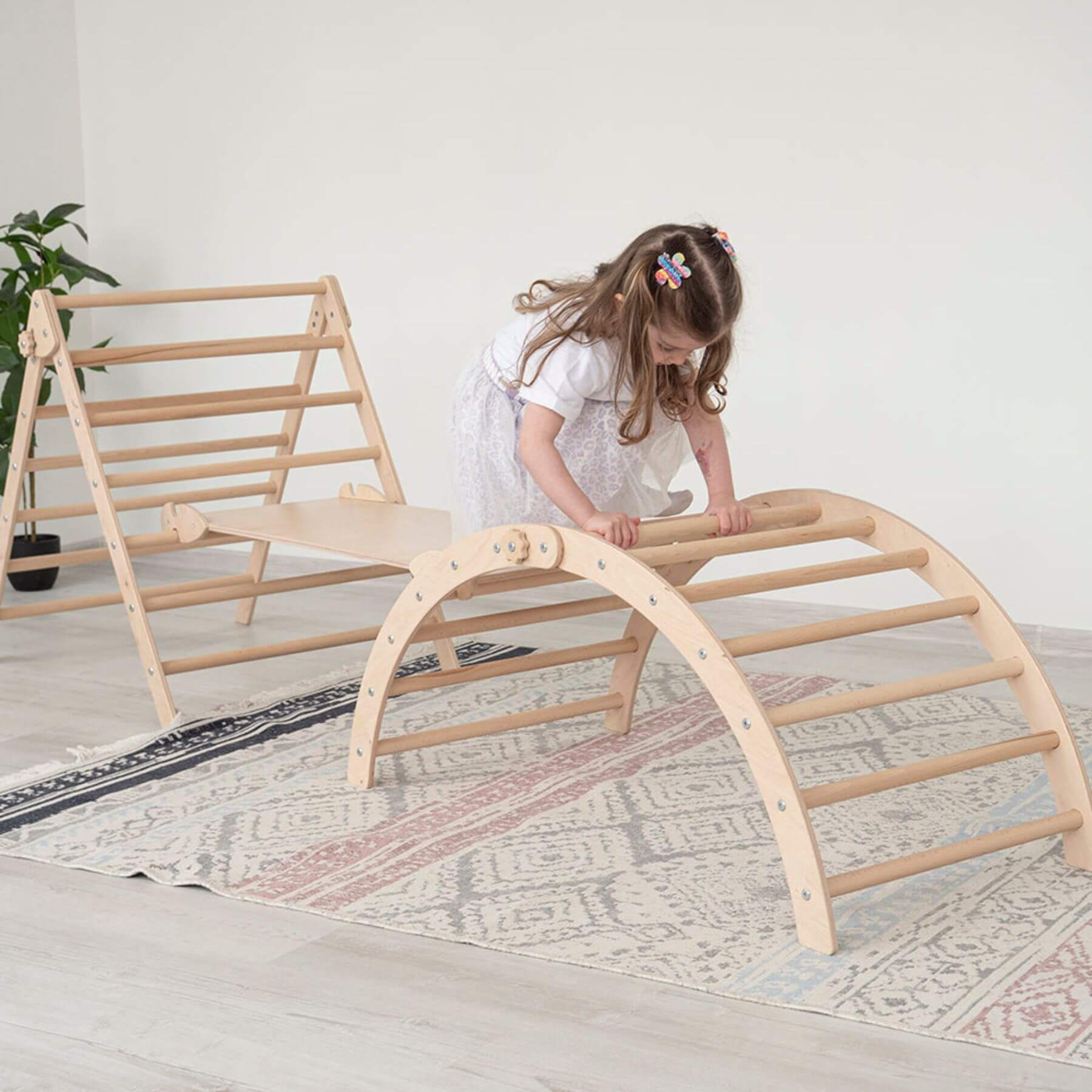 Girl Climbing on Wood and Hearts Triangle Climber Set Natural