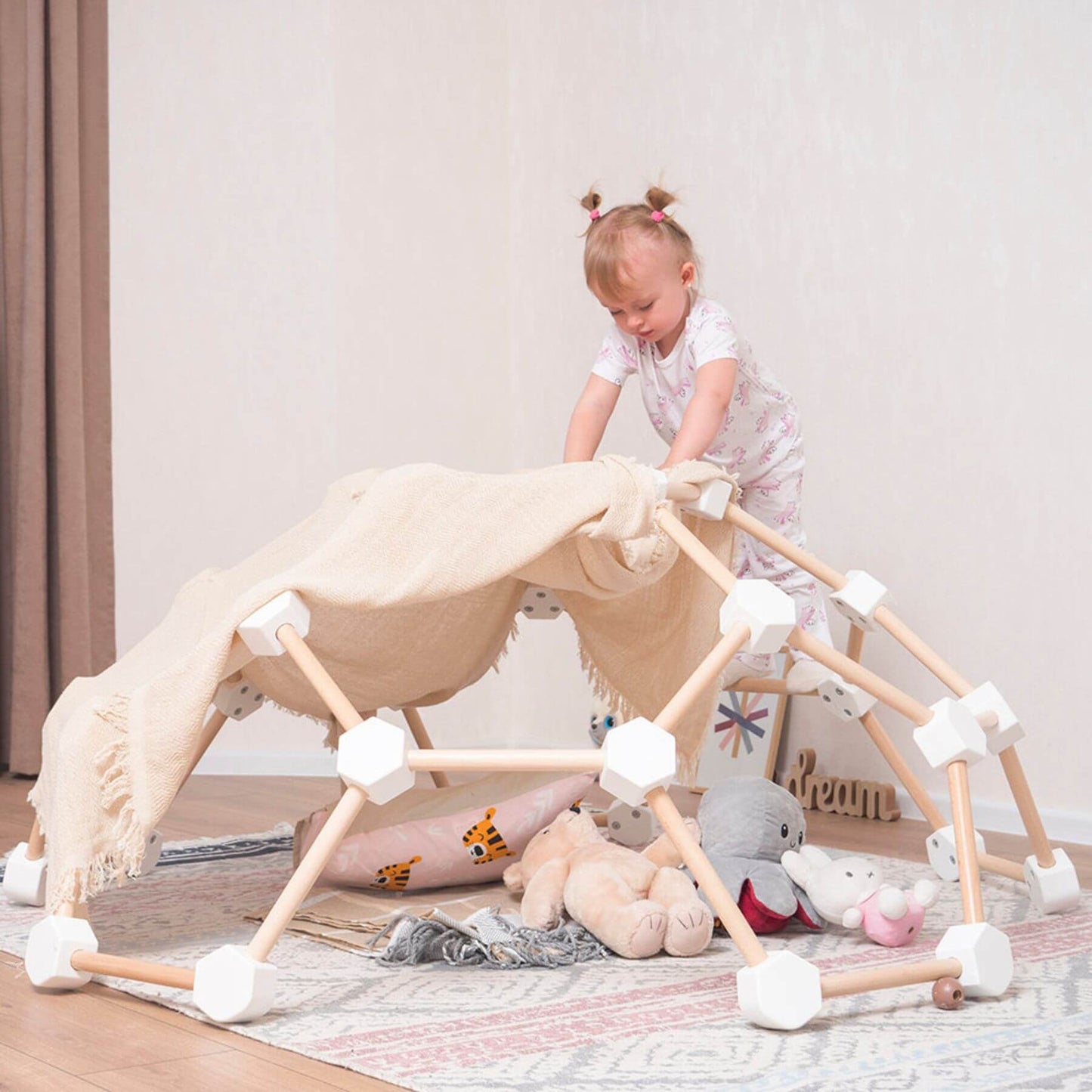 Girl Playing Wood and Hearts Wooden Climbing Dome