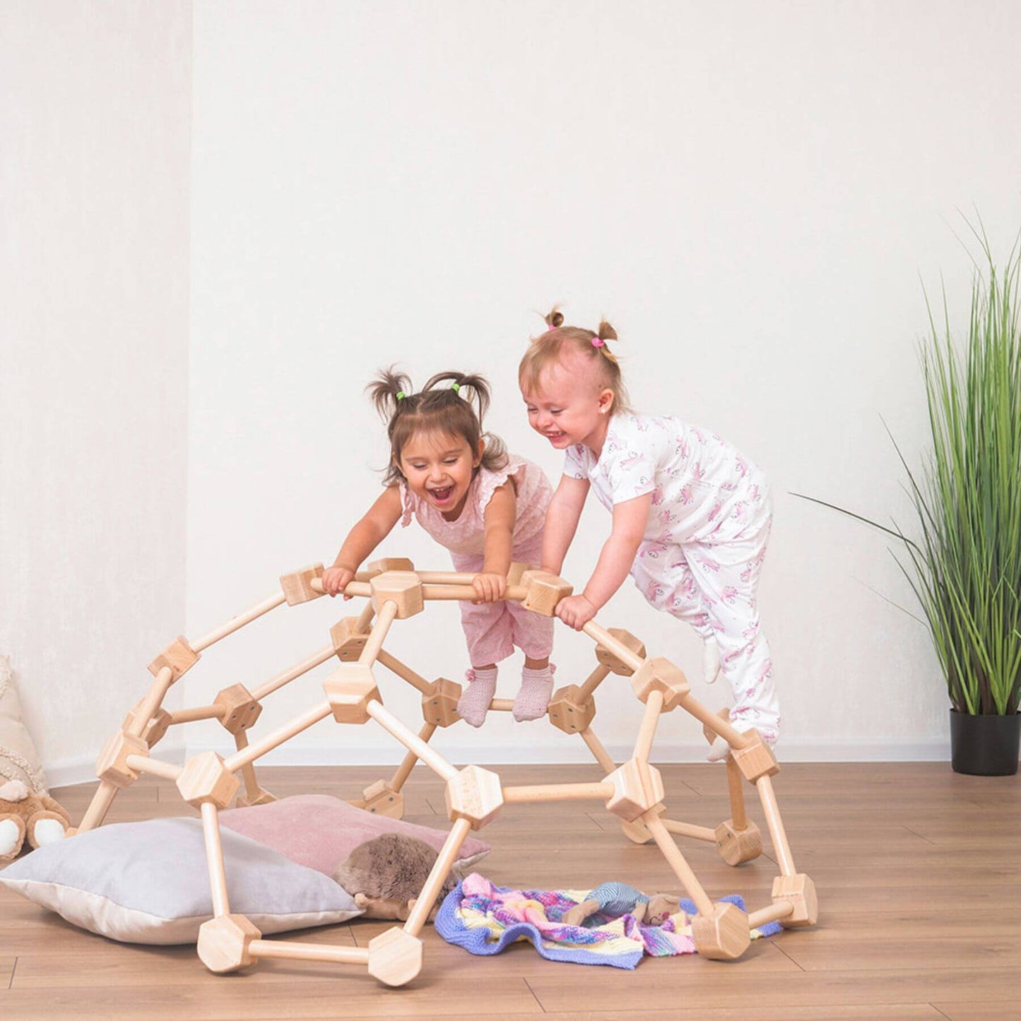 Girls Playing Wood and Hearts Wooden Climbing Dome
