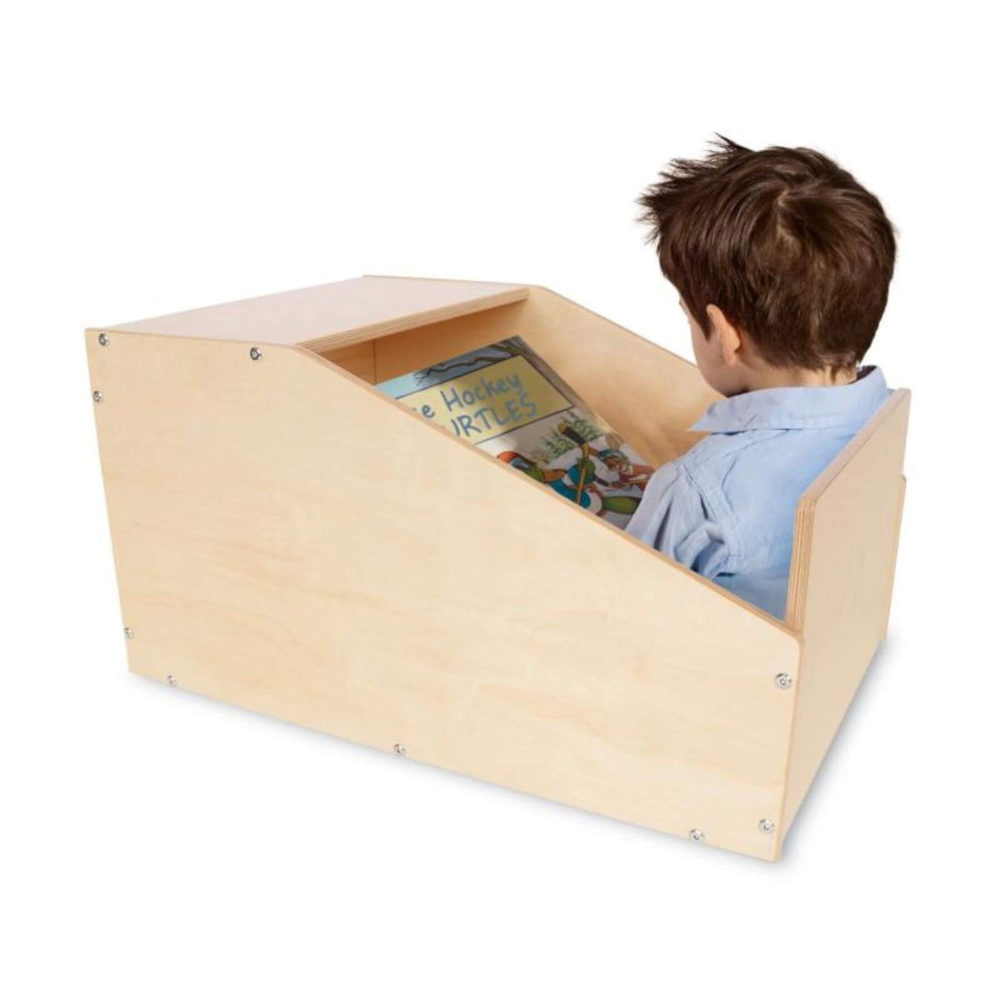 Boy Reading in Whitney Brothers Quiet Space Cubby