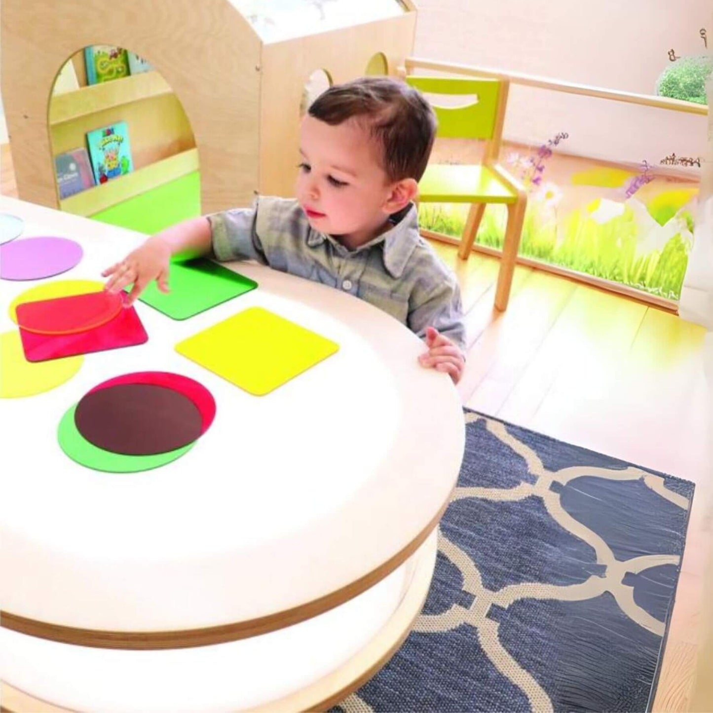 Boy Playing at Whitney Plus Radiant LED Light Table