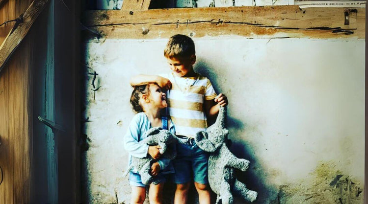 Two Boys with a Senger Doll