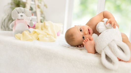 Baby lying on changing table