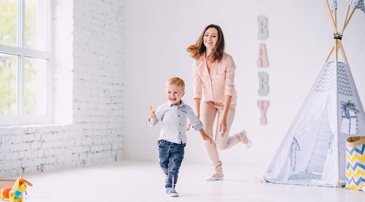 mom & baby in a nursery room