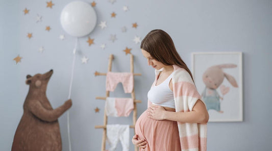 Mom in nursery room