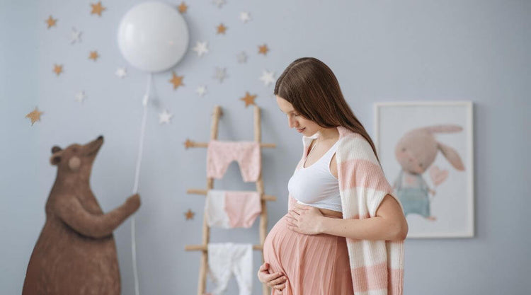 Mom in nursery room