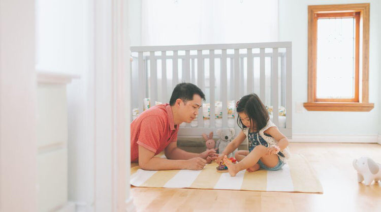 Girl & Dad playing on the floor