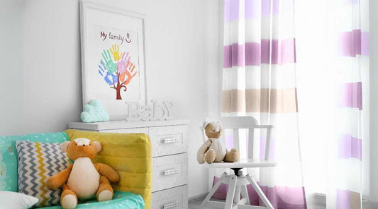 nursery room w/ pink curtain