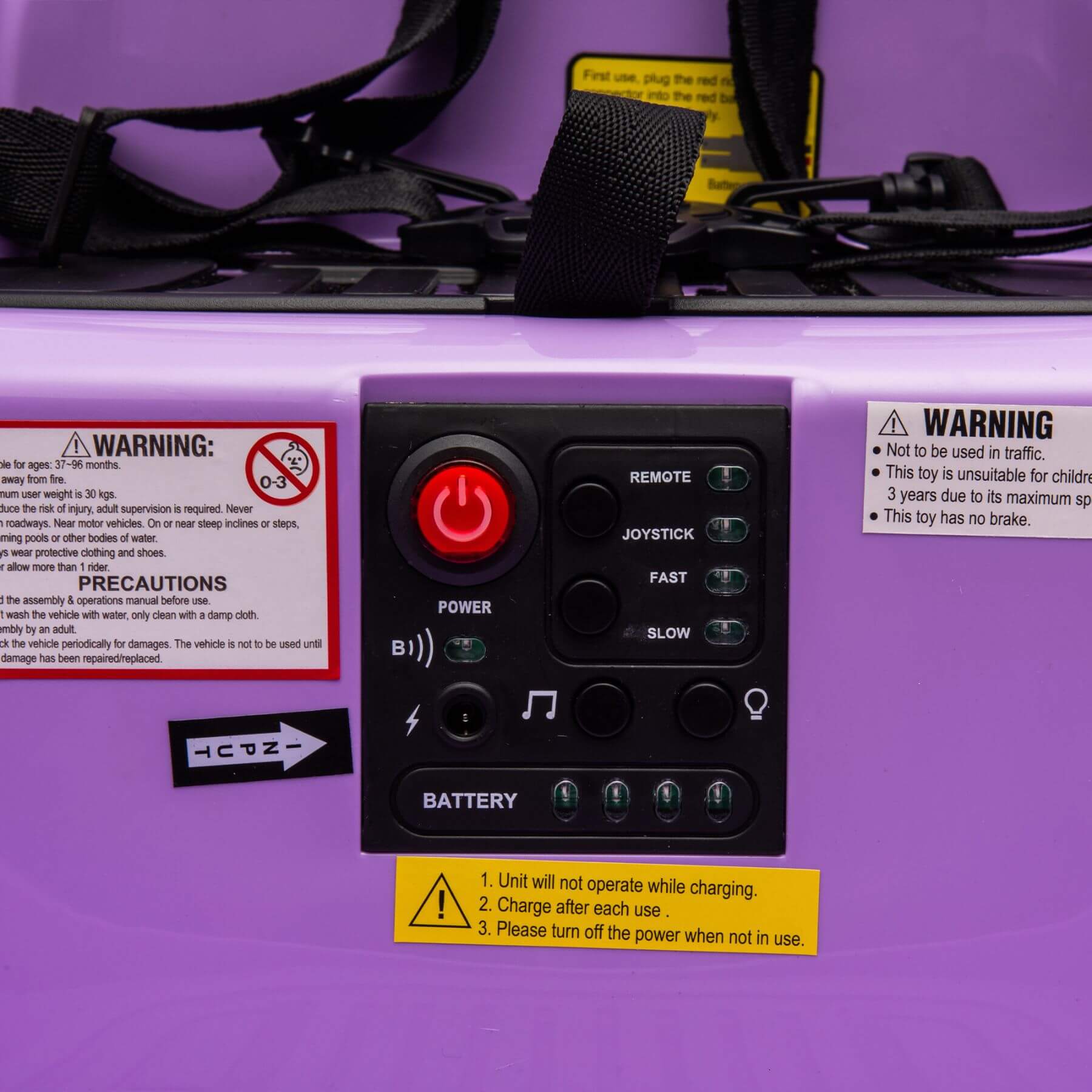 Control panel with buttons and warning labels