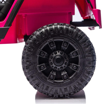 Close-up of a pink toy car with a black tire on a white background
