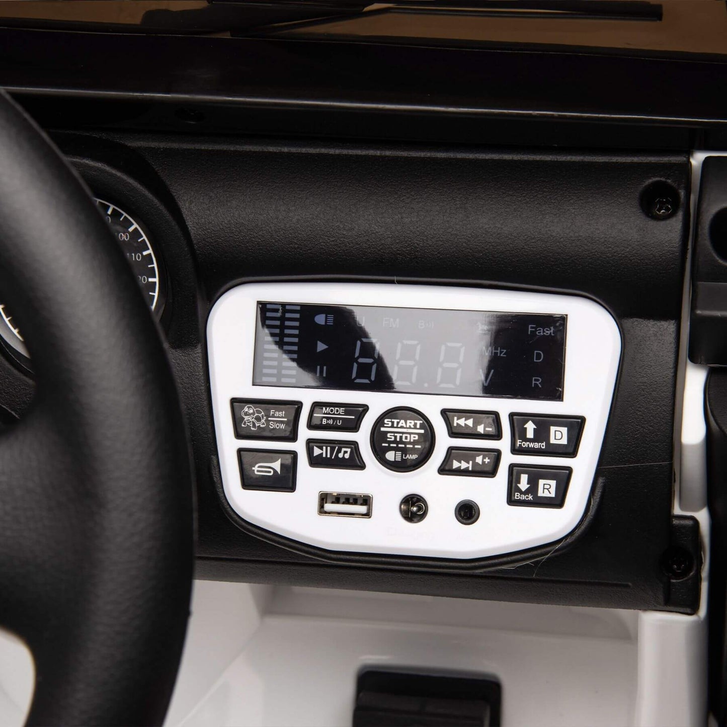 Car dashboard with a control panel featuring buttons and a display.